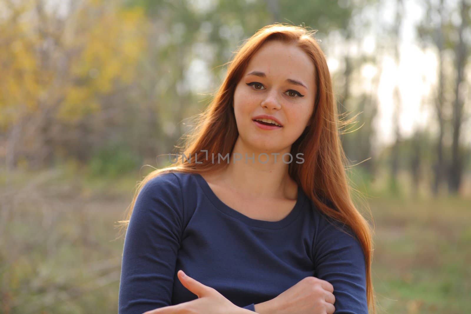 portrait of cute red haired young woman by mettus