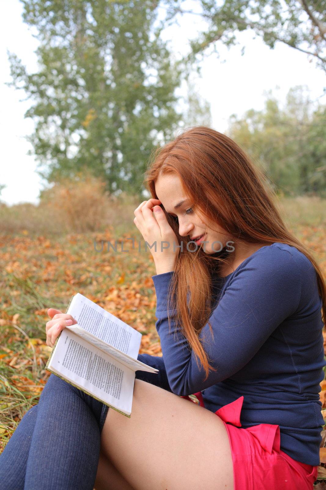 beautiful girl holding an open book by mettus