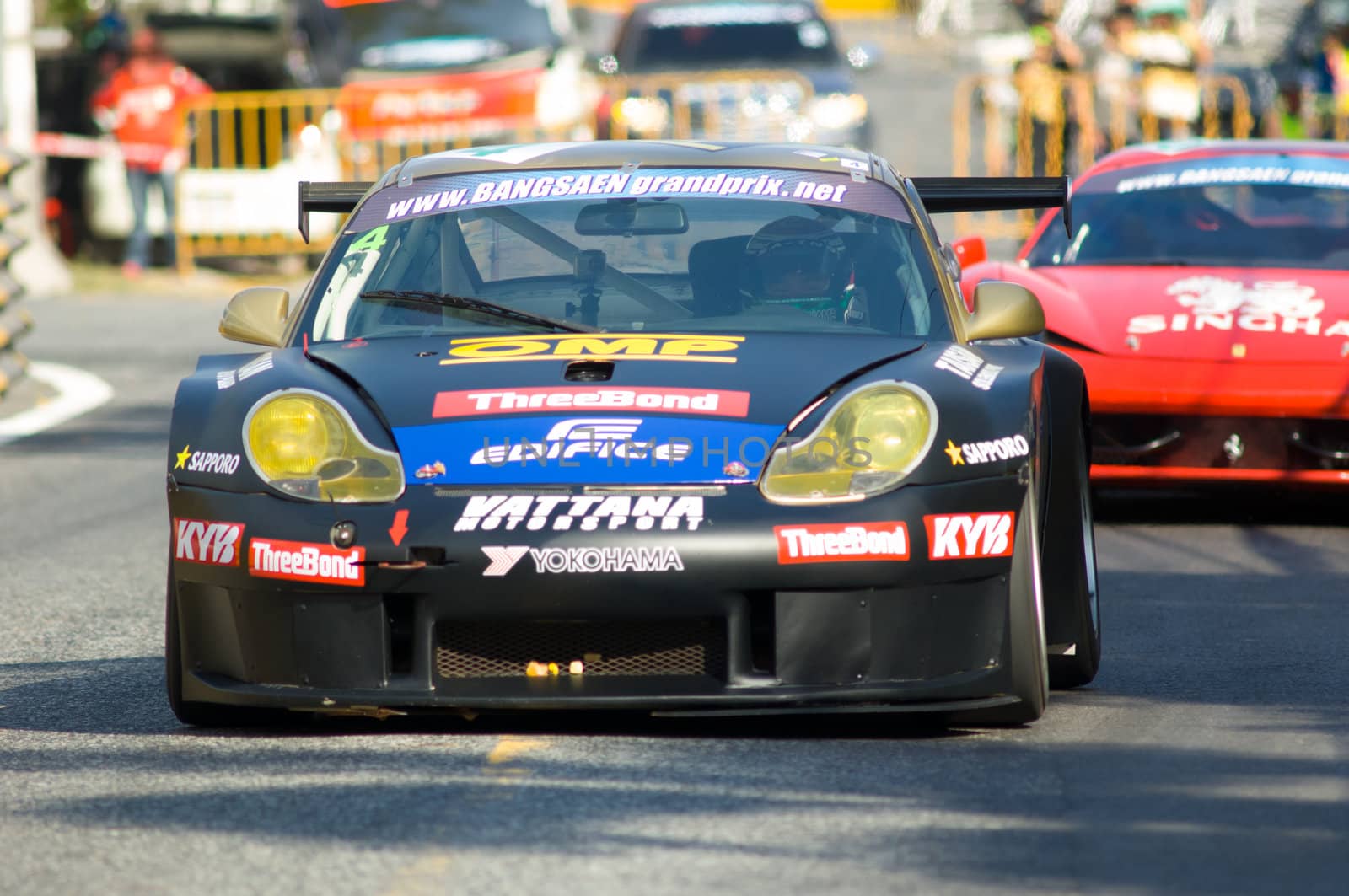 BANG SAEN - DECEMBER 22: Car 4, the Porsche 996 GT3R of Japanese driver Akihiro Asai, racing during the 2012 Bang Saen Speed Festival in Thailand on December 22, 2012.