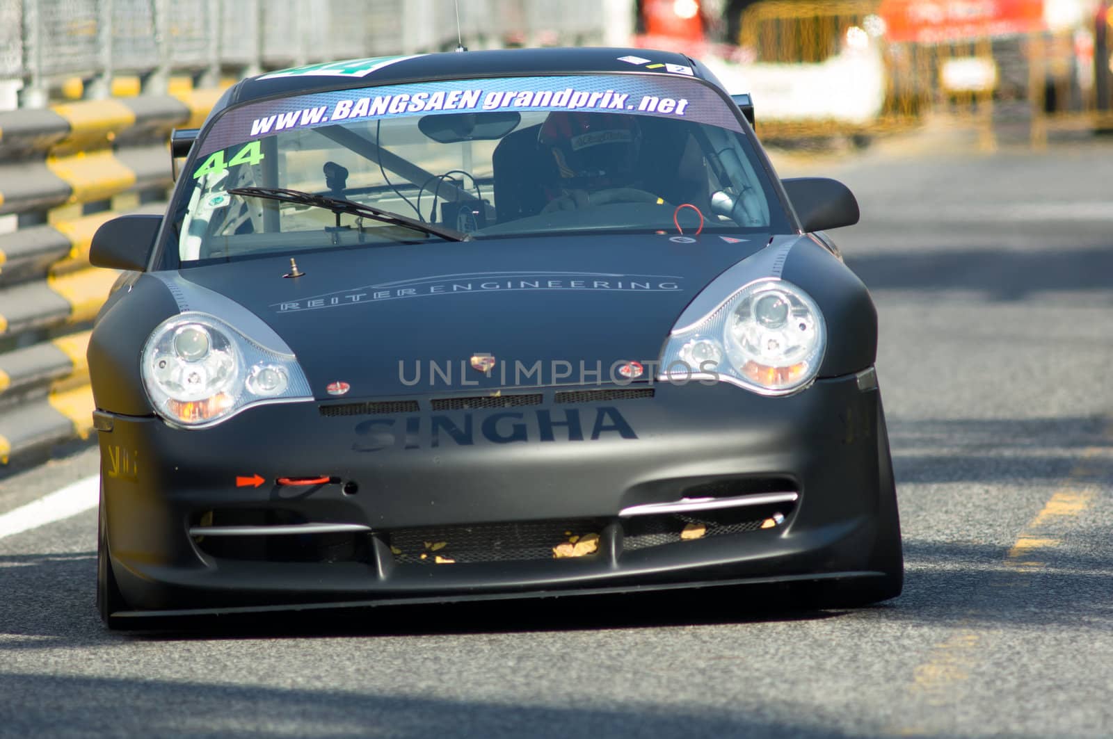 BANG SAEN - DECEMBER 22: Car 44, the Porsche 996 GT3 of Jack Lemvard, racing during the 2012 Bang Saen Speed Festival in Thailand on December 22, 2012.