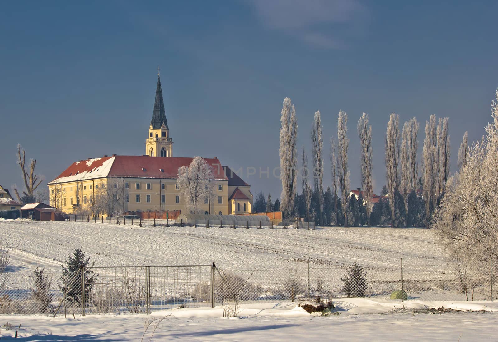 Greek catholic cathedral in snow landscape, Krizevci, Croatia