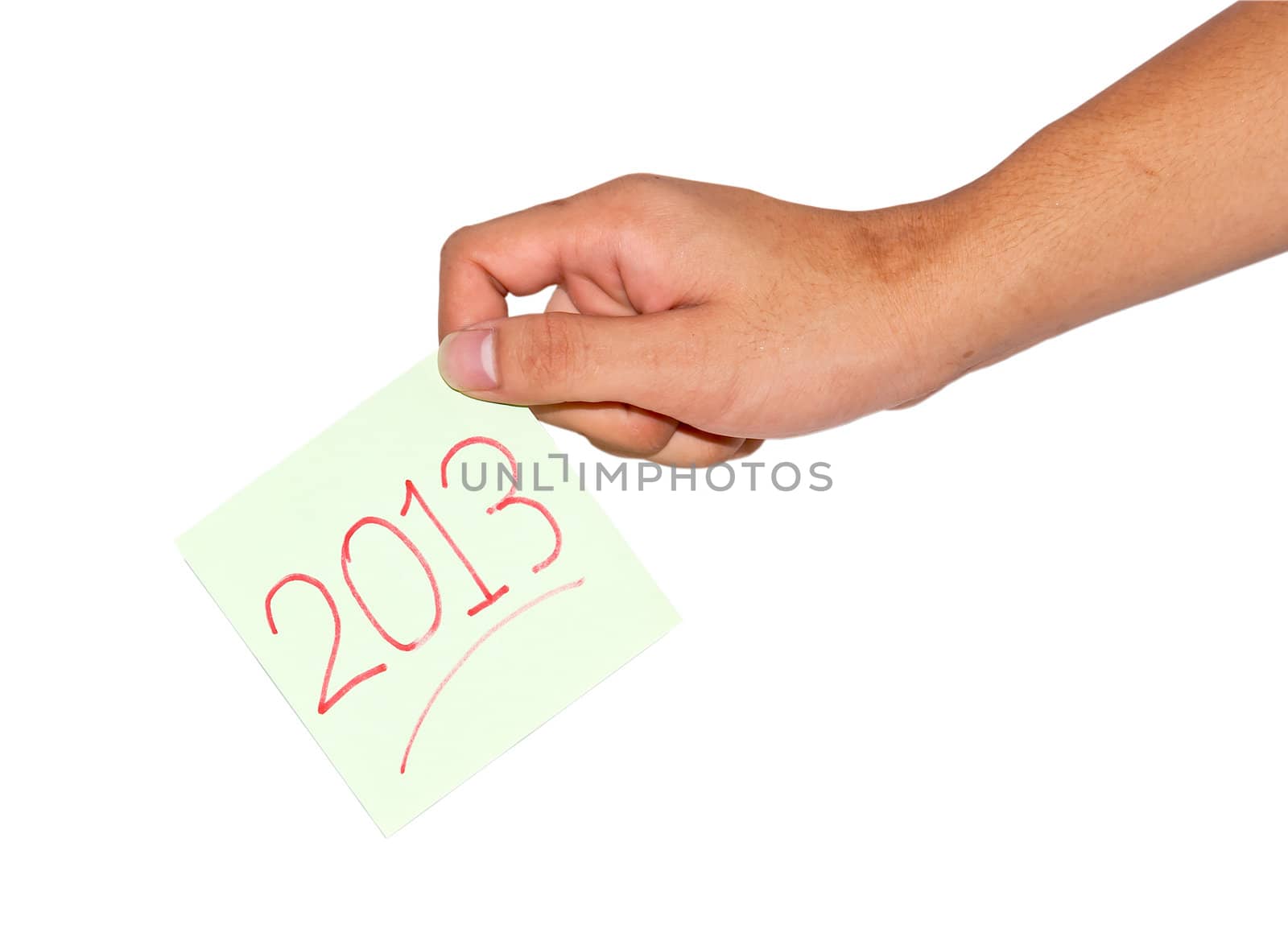Hand holding a paper notebook wrote that in 2013
