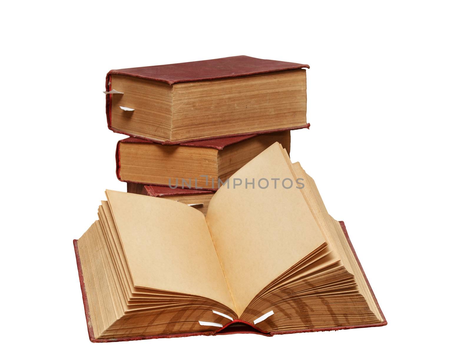  A stack of old books on a white background. One book is open, clean pages, you can add text or picture.