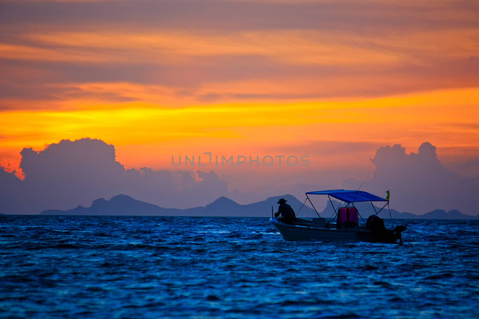 Silhouette boat in the sea