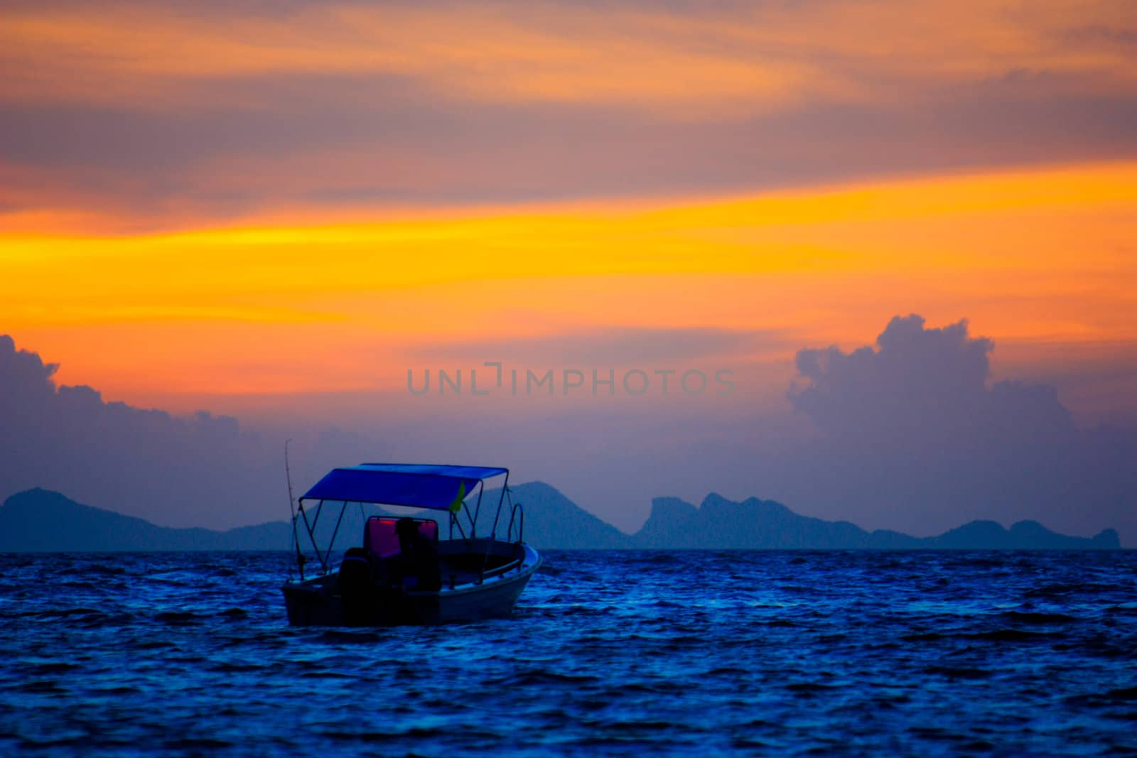 Silhouette boat in the sea