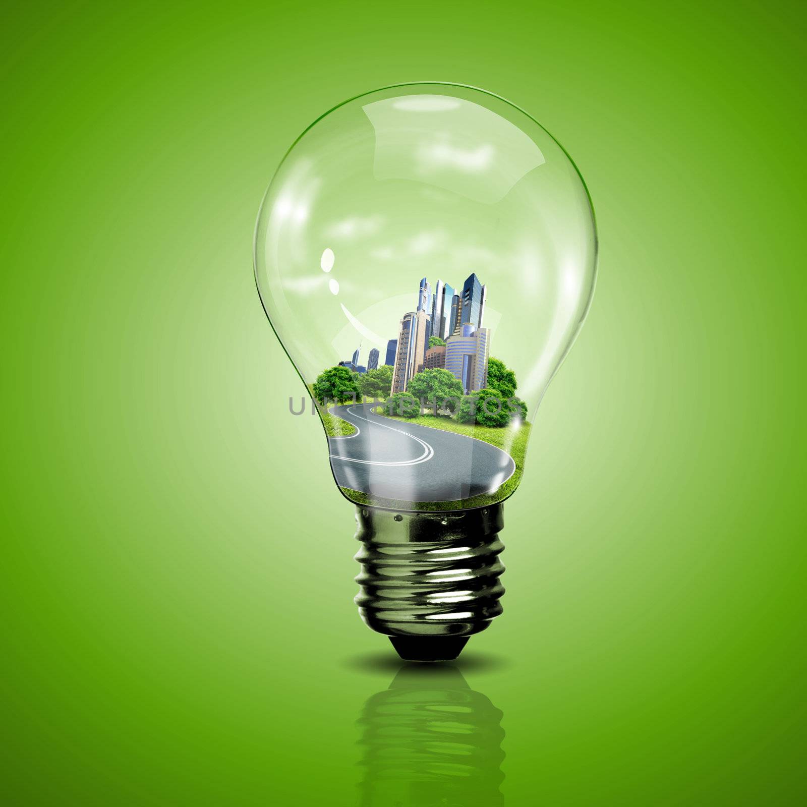 Electric light bulb and our planet inside it as symbol of green energy