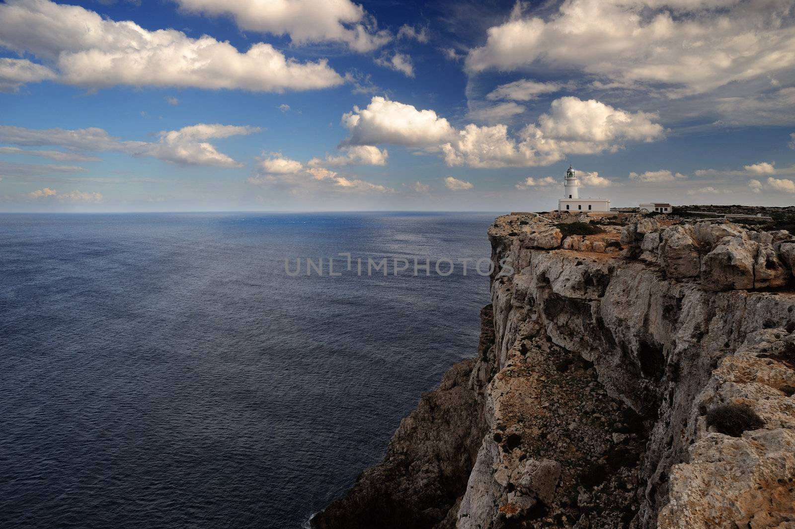 Landscape with a lighthouse on the cliff