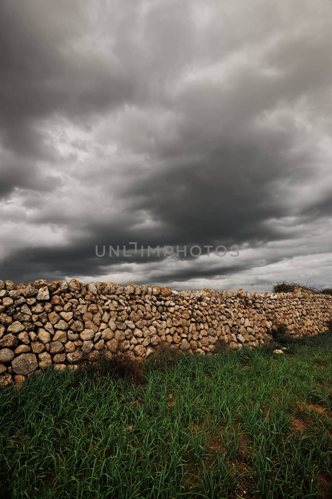 Landscape with an ancient stone wall