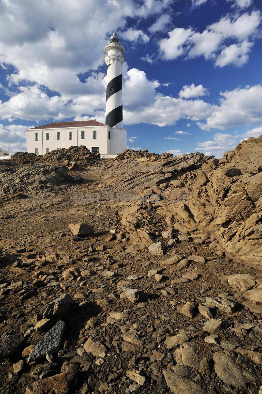 Landscape with a lighthouse on the cliff