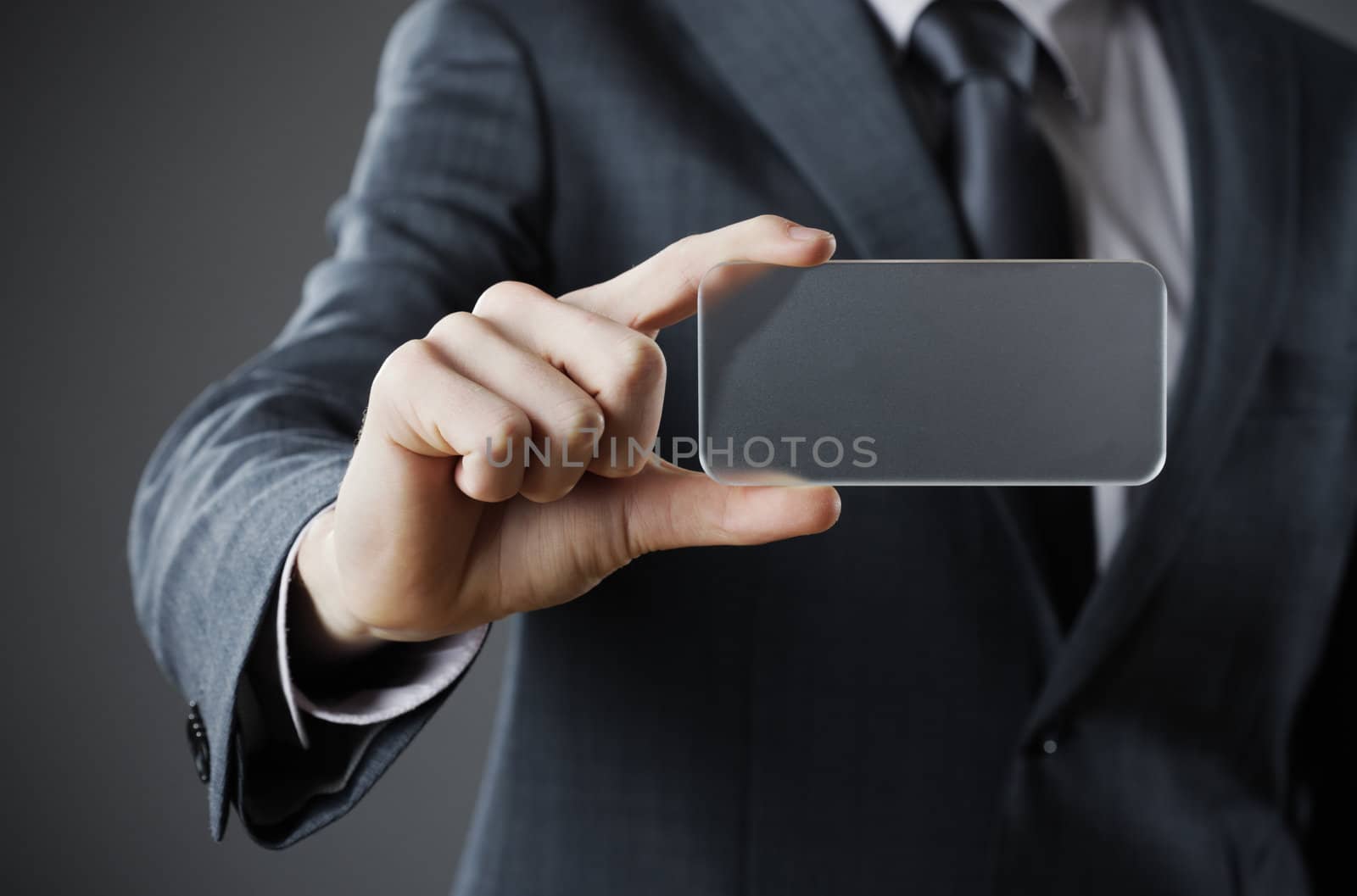 Businessman holding blank business card, add text here