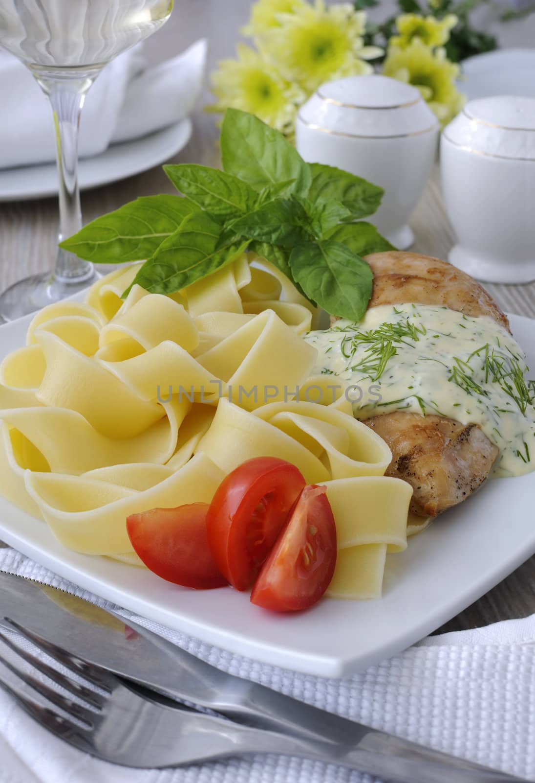 Italian pasta - Pappardelle with chicken in cream sauce and cherry tomatoes