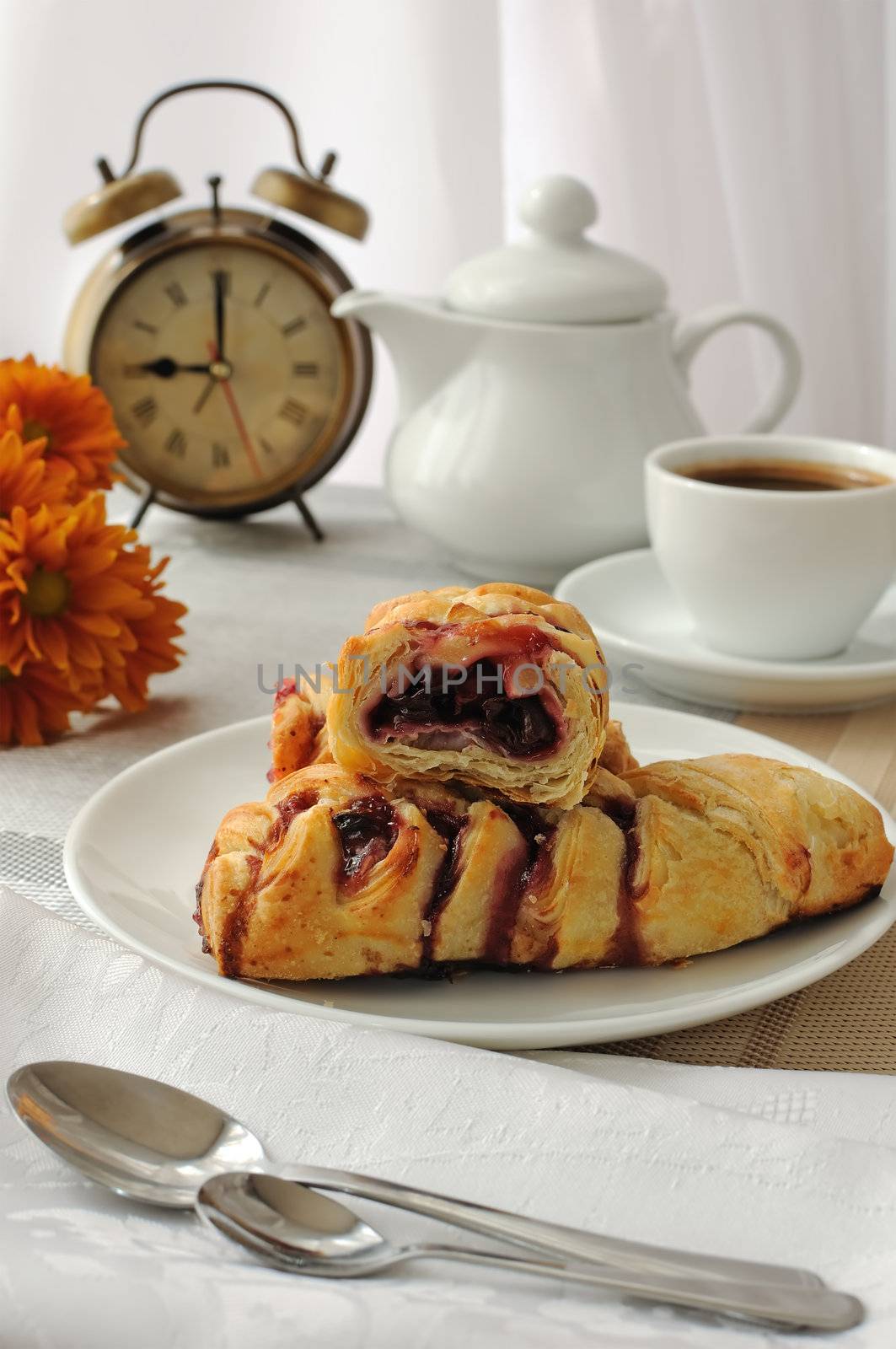 Mini cherry strudel with a cup of coffee by Apolonia