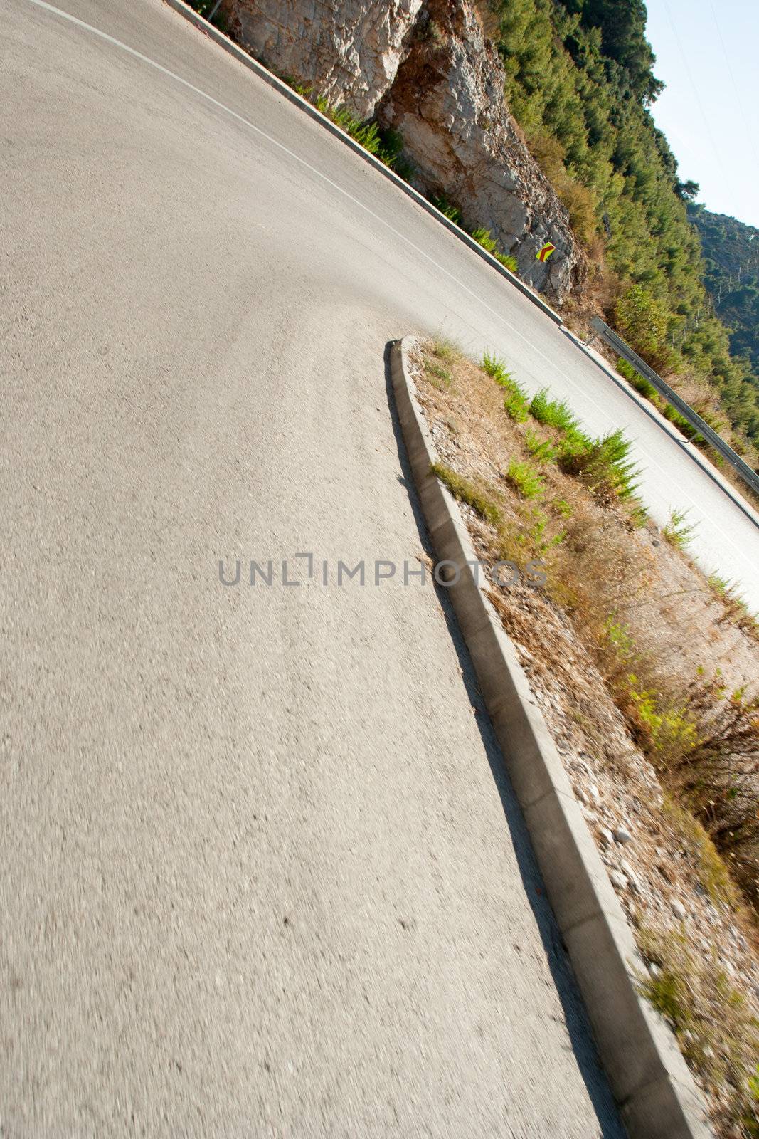 winding road in deserted landscape in vis island