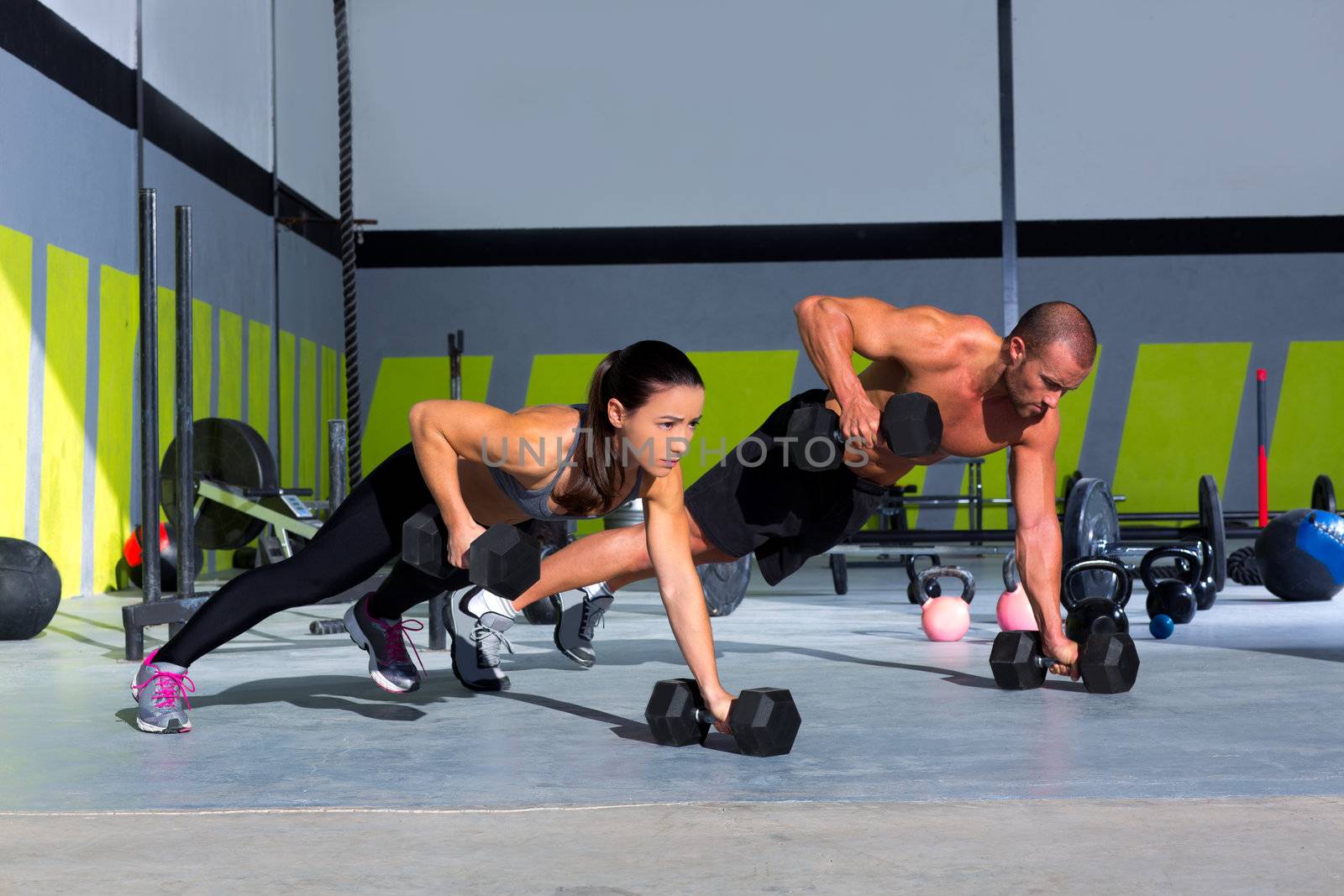 Gym man and woman push-up strength pushup by lunamarina
