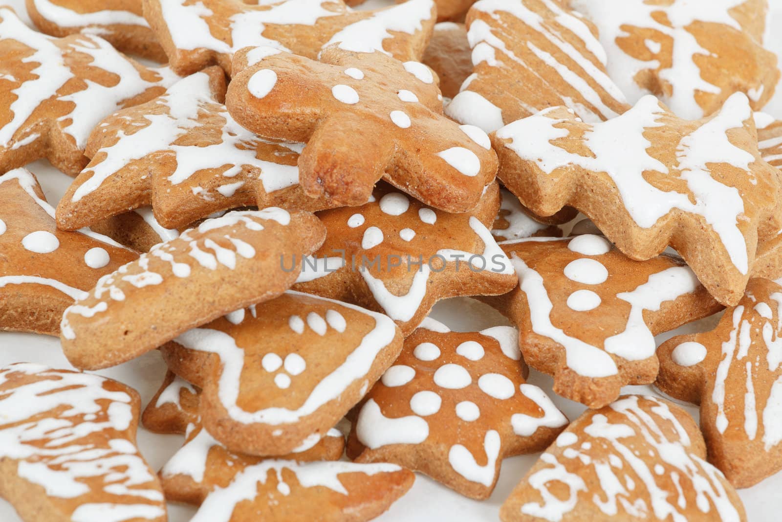 homemade christmas gingerbreads on white background