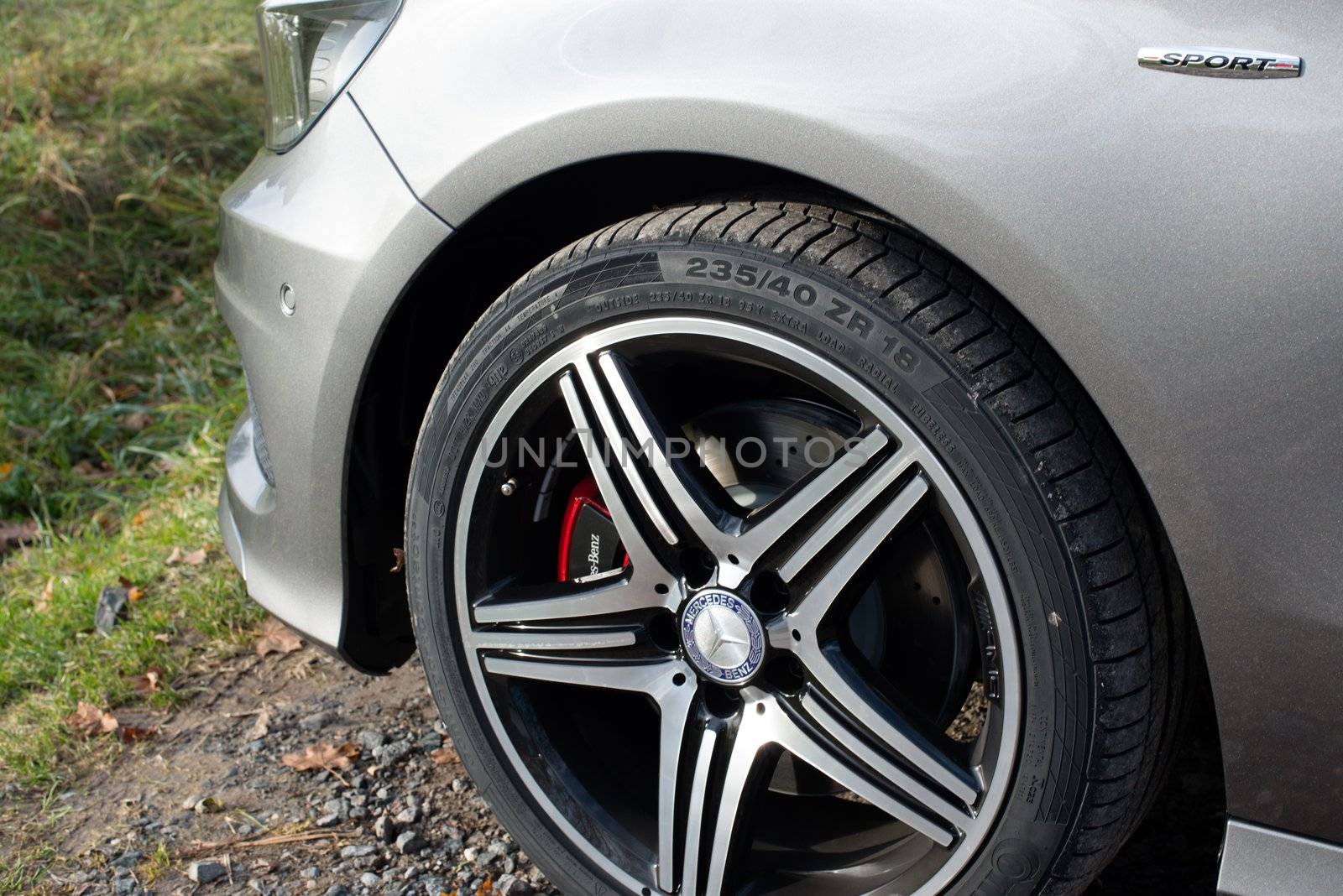 STUTTGART - NOVEMBER 21 : Detail of the new Mercedes Class A 250 AMG Sport parked in front of Solitude Palace on November 21, 2012 in Stuttgart, Germany. The new A-Class is a complete makeover of the previous generations, the 250 AMG Sport is the largest version available, developed together with car tuner AMG.