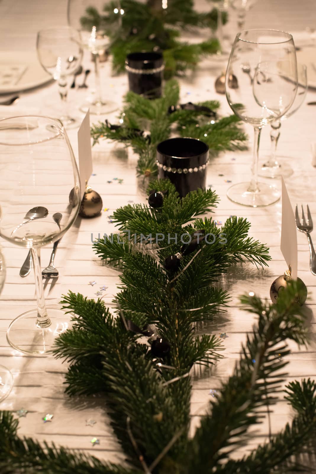 Festive XMas Table - Beautiful white, green and silver place setting for Christmas in emotional light