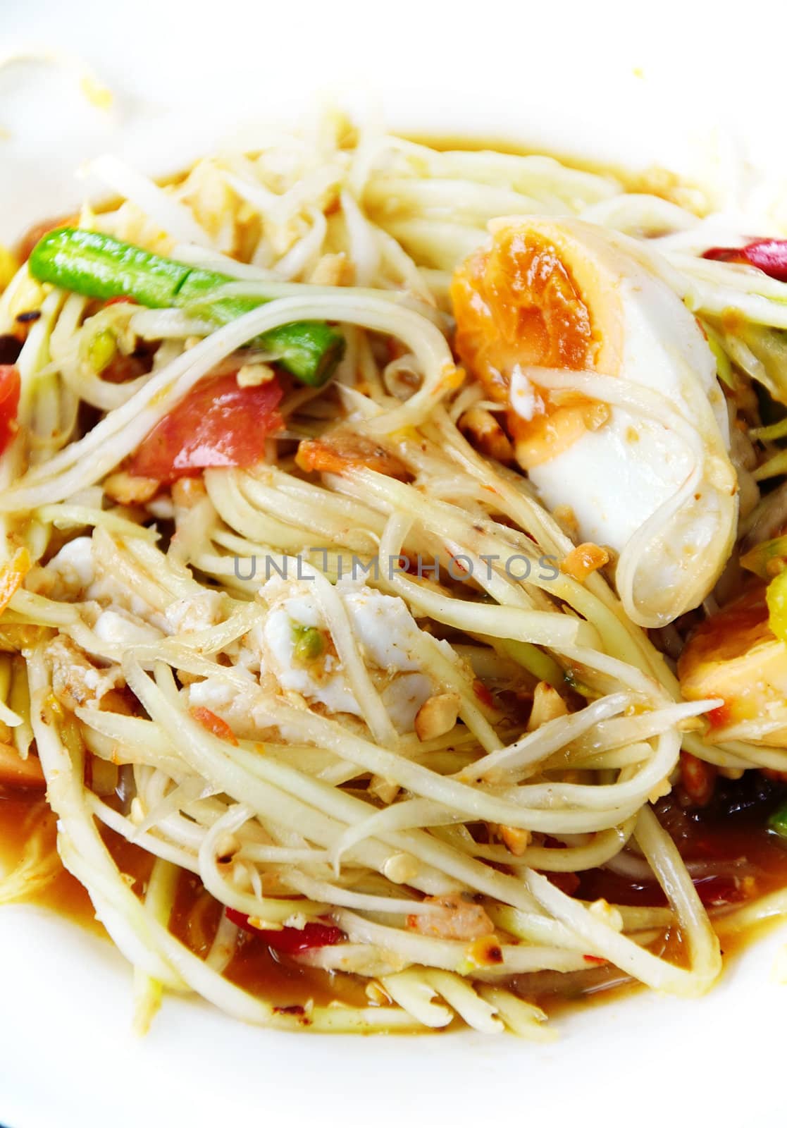 Green papaya salad with salted egg thai cuisine spicy delicious 