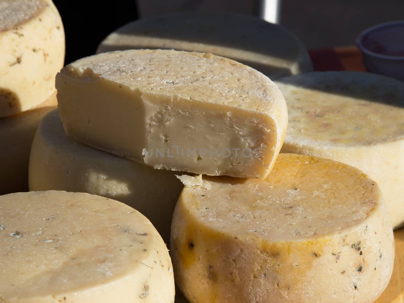 Different sorts of  cheese at a market