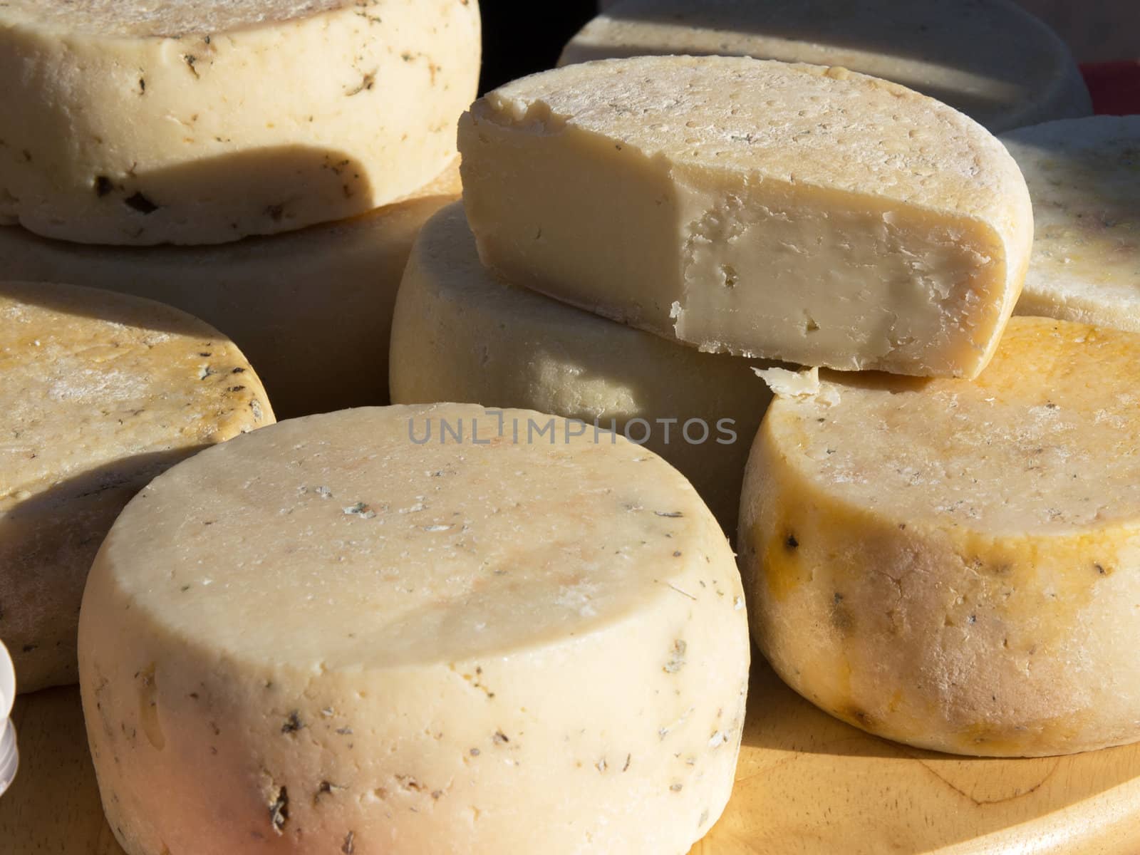 Different sorts of Italian cheese at a market