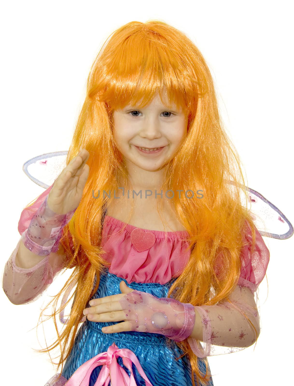 Girl in fancy dress and a wig on a white background