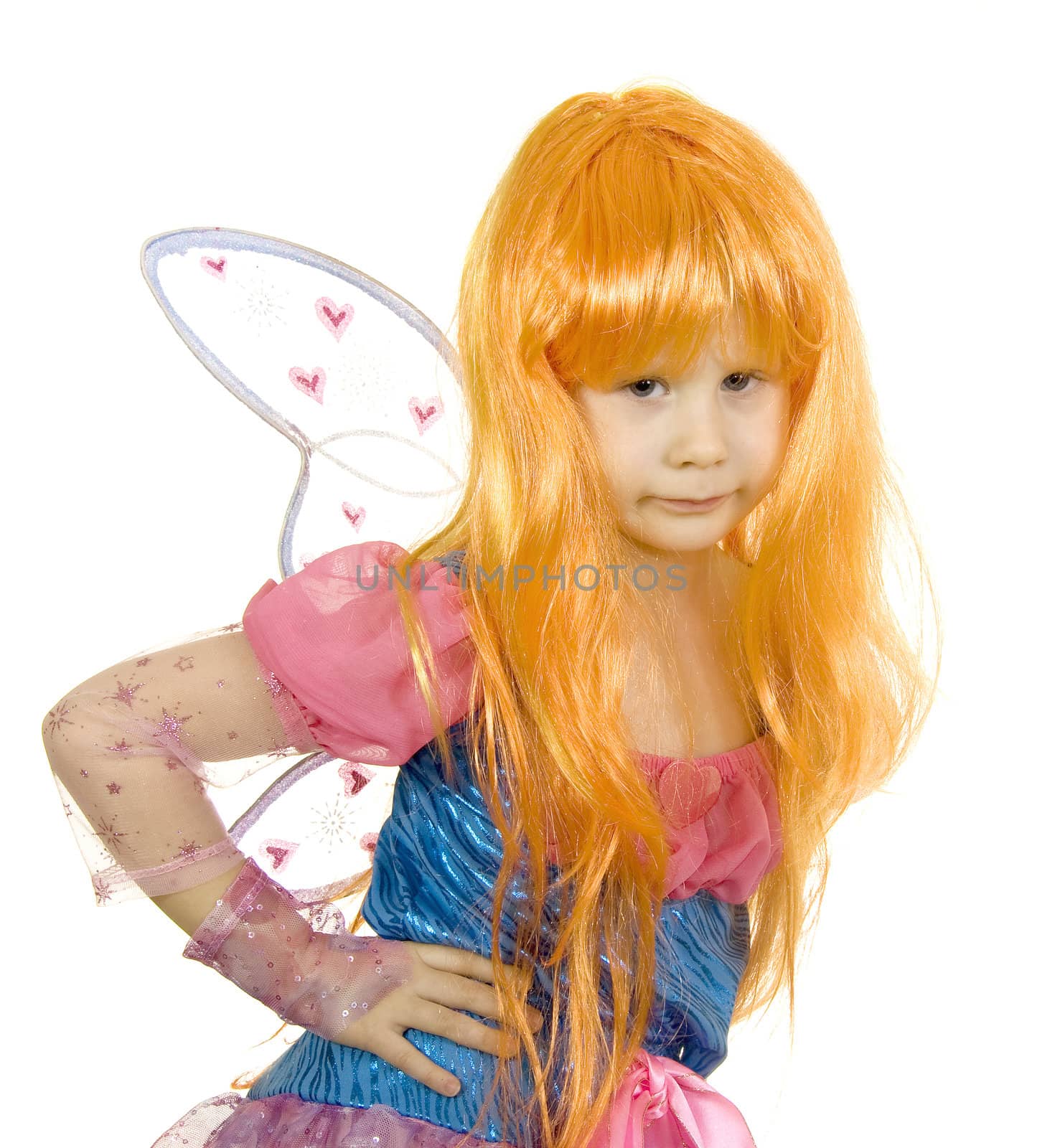 Girl in fancy dress and a wig on a white background