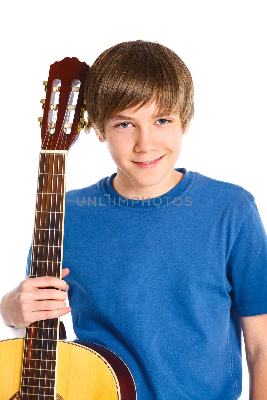 Portrait of cute boy with classical guitar. Isolated on white background