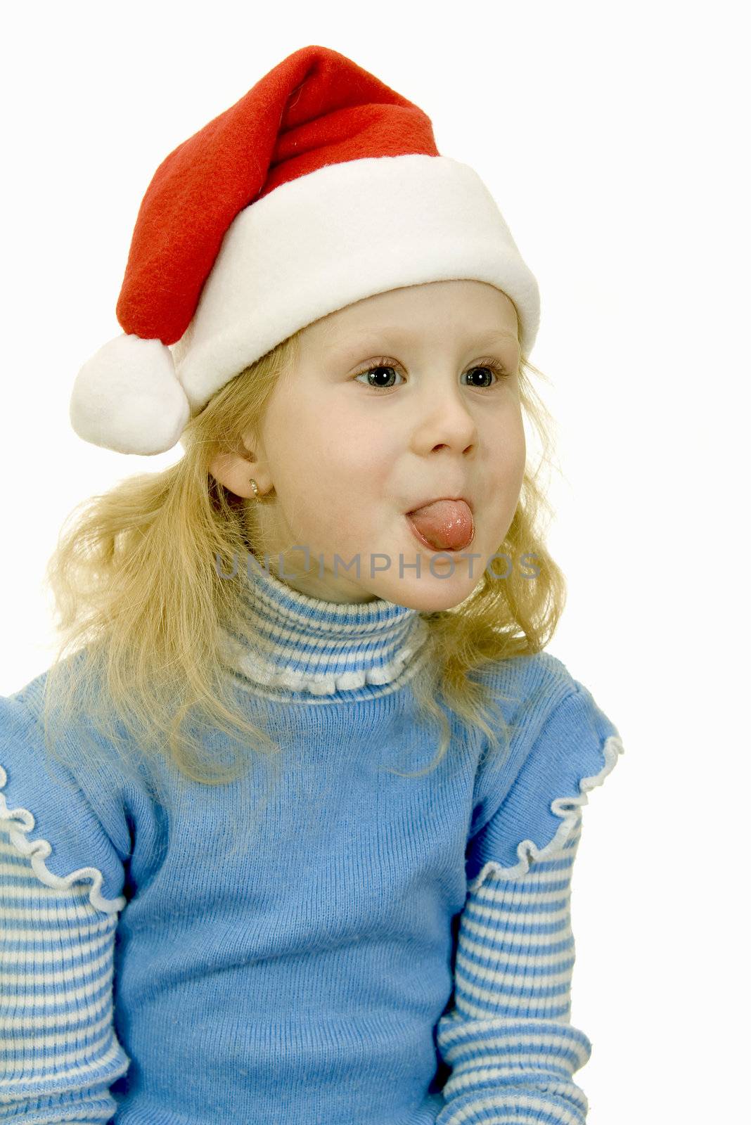 girl in the hat of Santa Claus on a white background