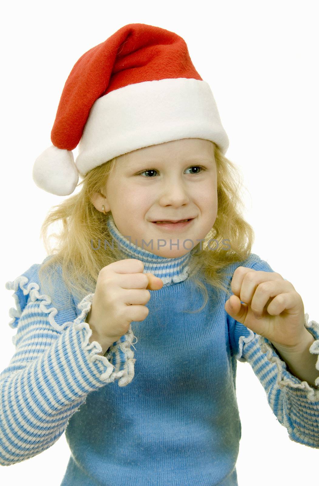 girl in the hat of Santa Claus on a white background