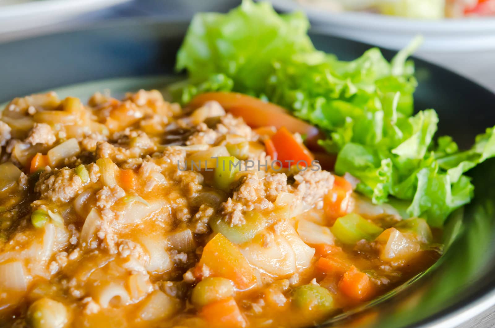 close up wide noodles in a creamy sauce