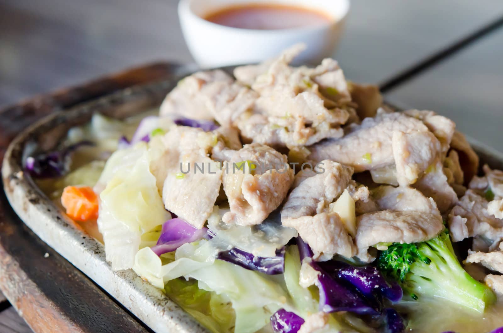 pork  fried with oyster sauce  and broccoli and cabbage
