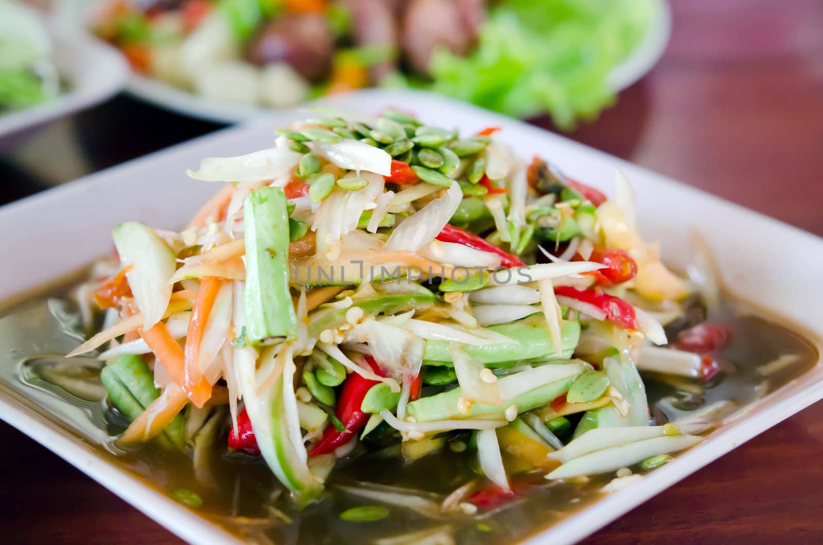 thai papaya salad hot and spicy , Thai call  "Som Tam"