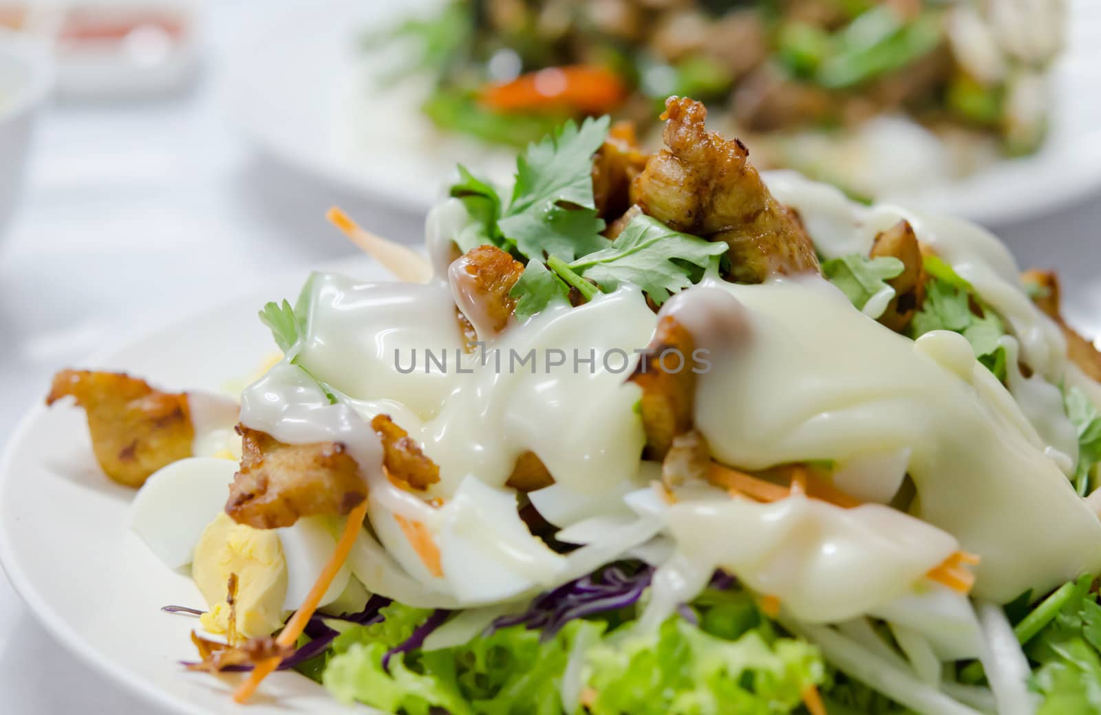 Caesar Salad with fried chicken  ,  fresh vegetable and cream sauce