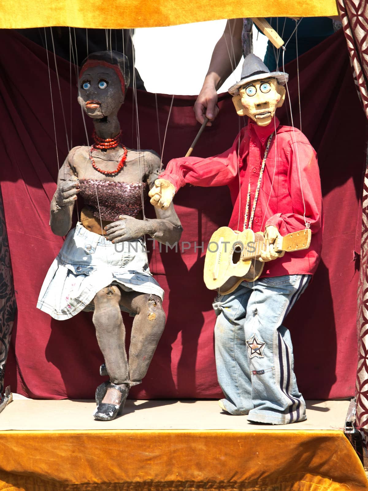 pair of marionettes dancing on the streets of florence