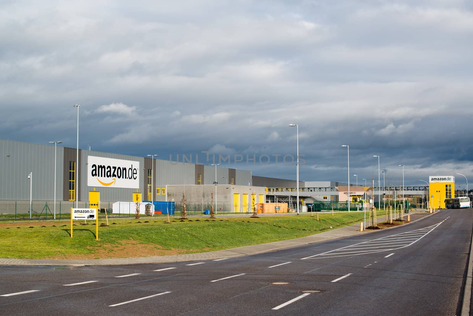PFORZHEIM - DECEMBER 28, 2012: The newly opened warehouse of retailer amazon.de, the German subsidiary of amazon.com on December 28, 2012 in Pforzheim, Germany. This is the 8th warehouse opened by Amazon in Germany; it has a size of about 110.000 square meters and provides jobs for several hundred workers.