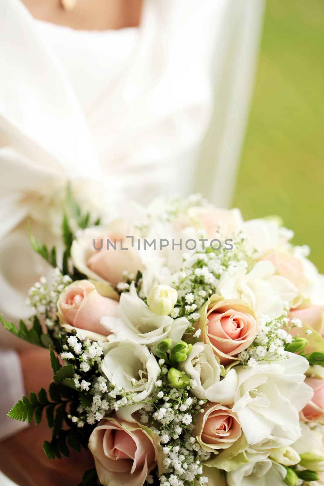 Close up of beautiful and fresh bride flowers bouquet