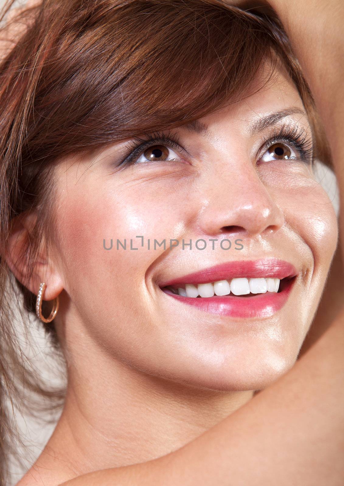 closeup of beautiful happy woman face that smiling