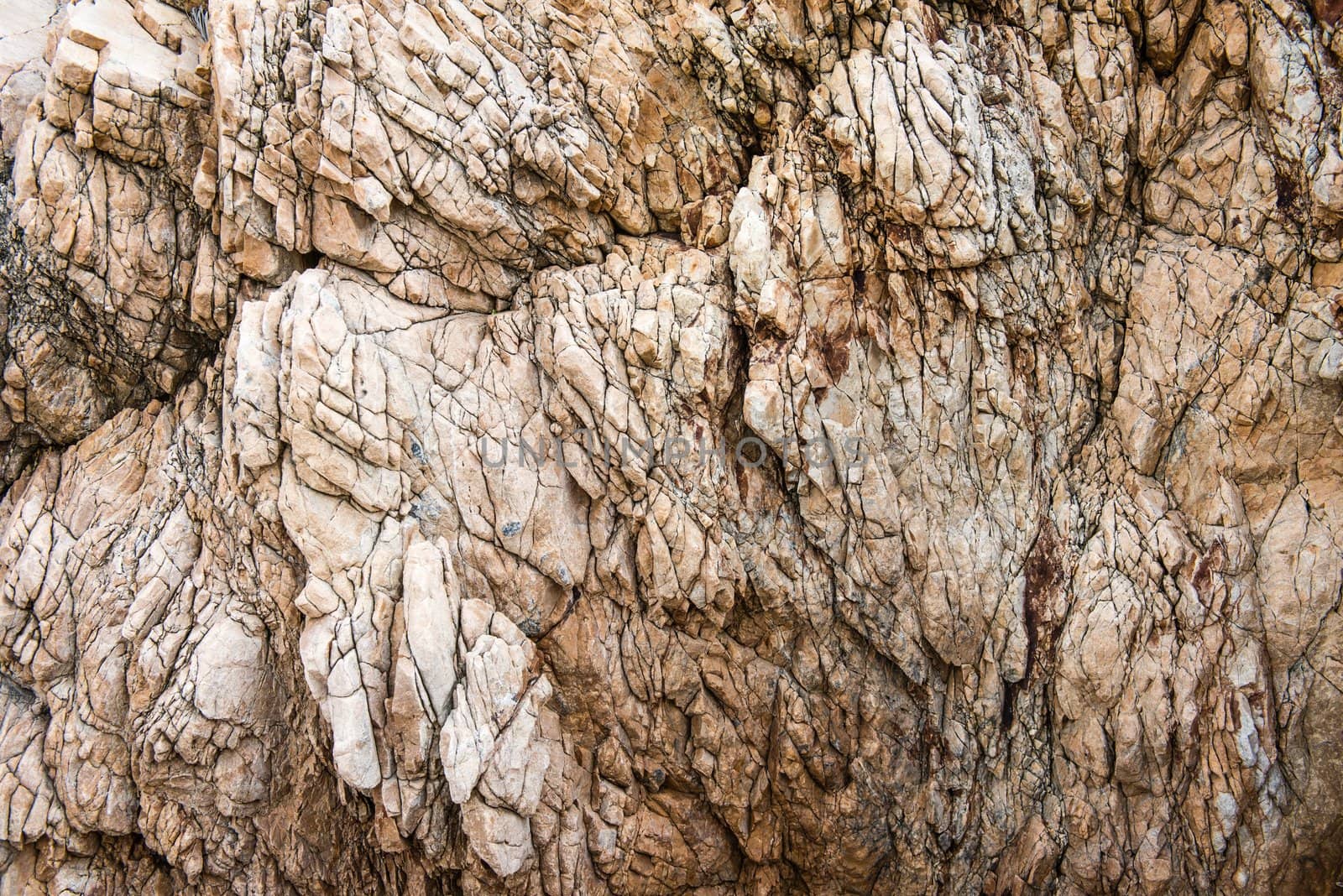 Solid limestone rock texture with muliple cracks by sasilsolutions