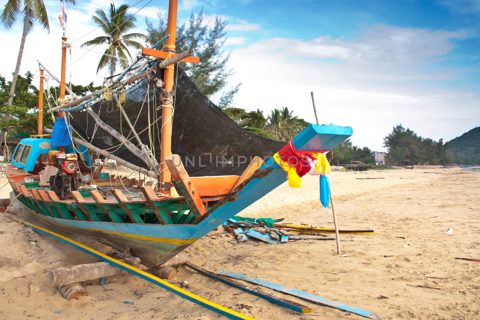Fishing boats that are waiting to be repaired.