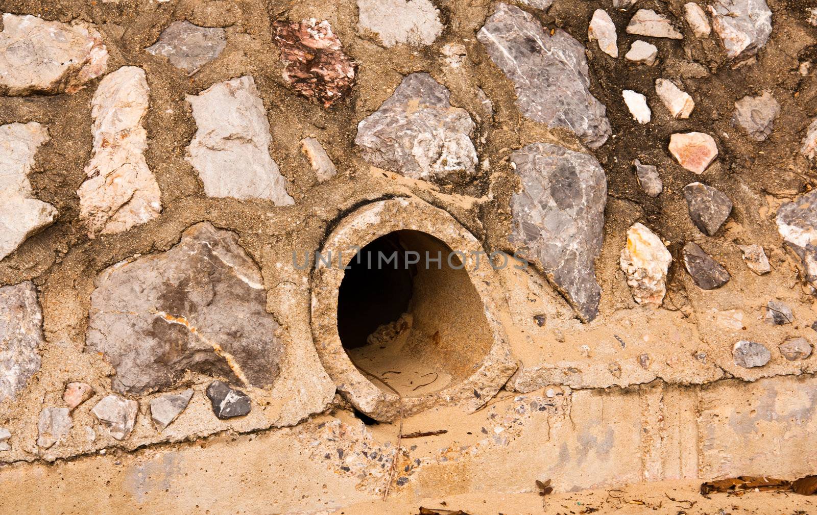 Sewer side of the wall. The old and worn.