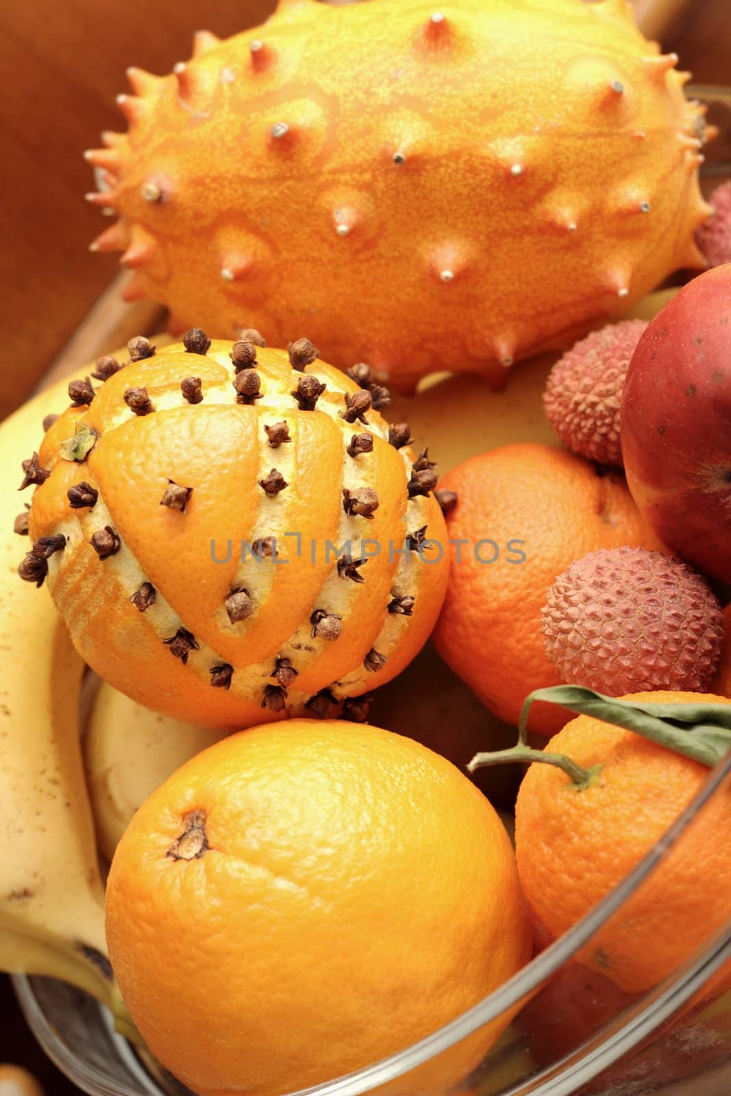 bunch of colorful exotic fruits and decorated orange