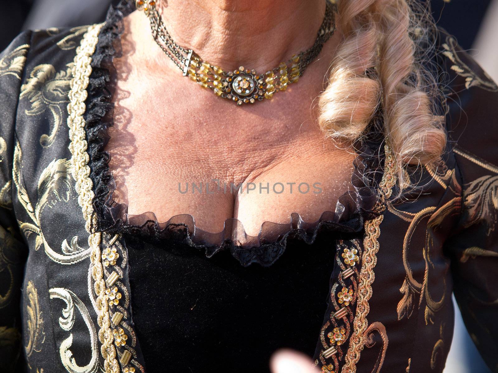 decollete of old woman on the Venice carnival