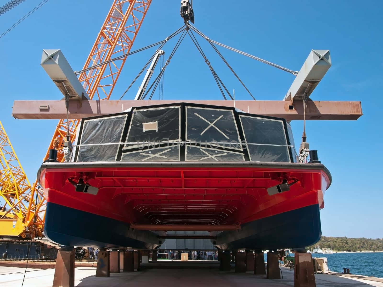 launching new catamaran with launching device - front view