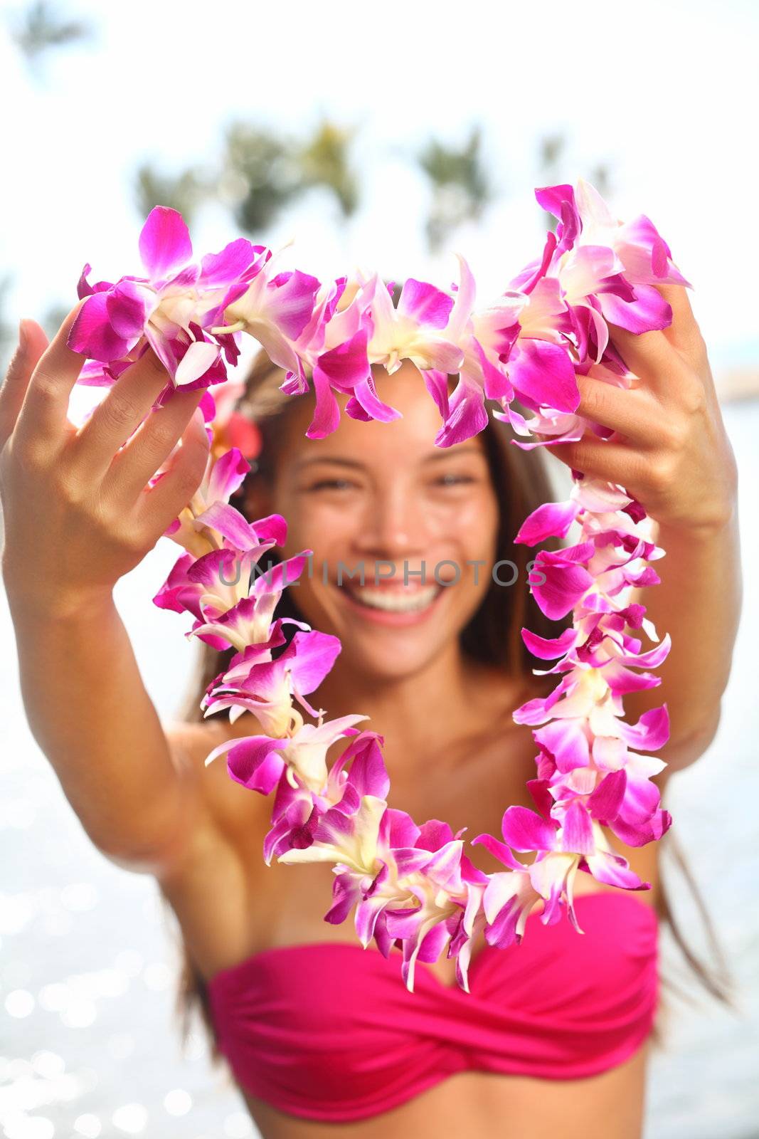 Hawaii woman showing flower lei garland by Maridav