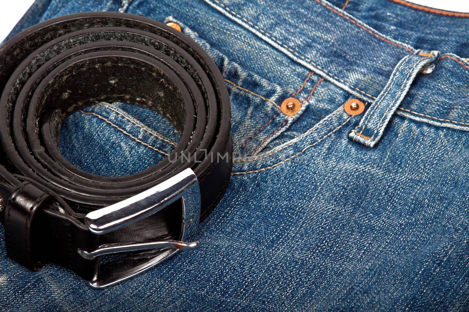 blue jeans and brown belt 