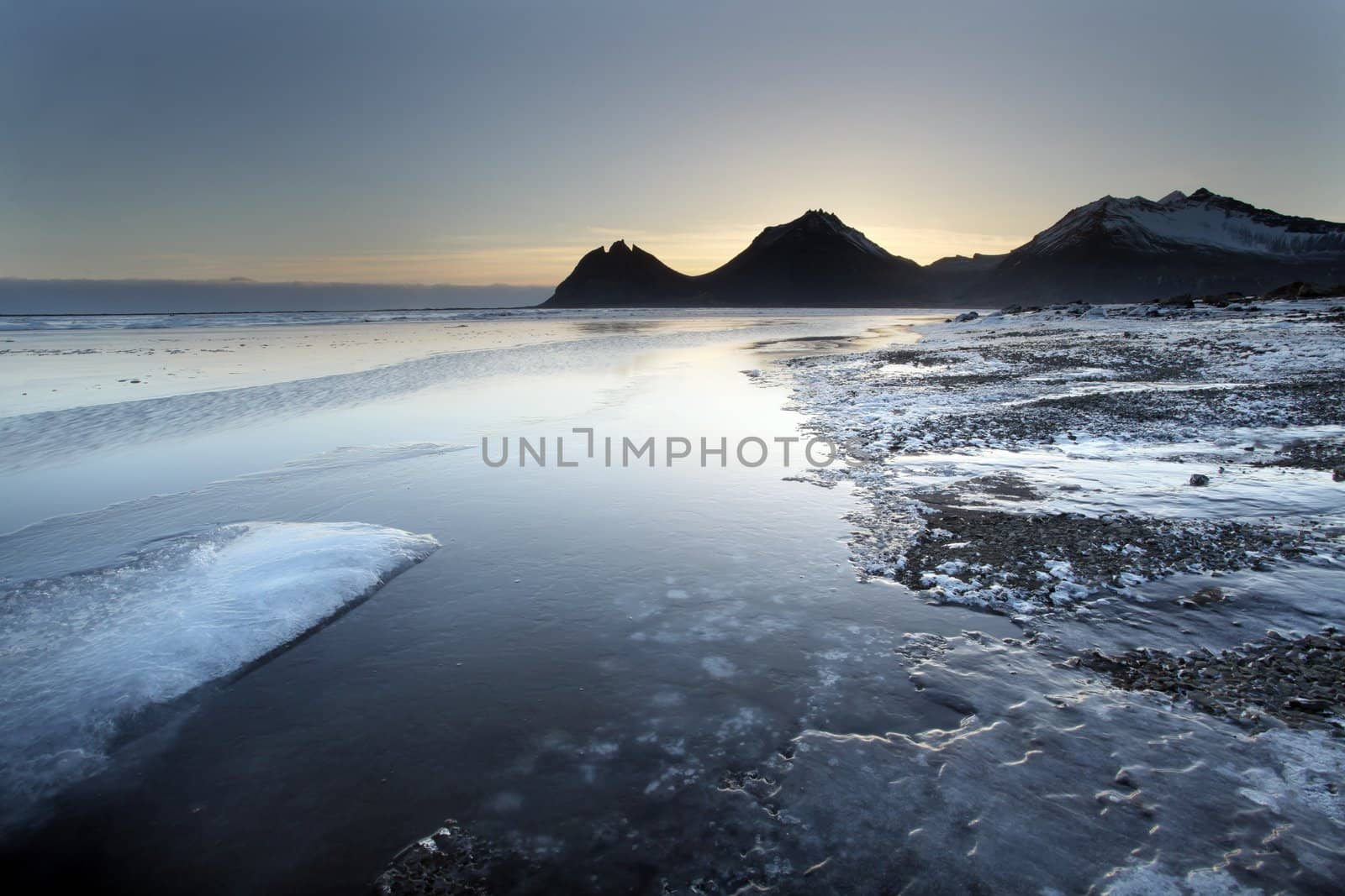 Ice shapes in the east fjords iceland at sunset in winter