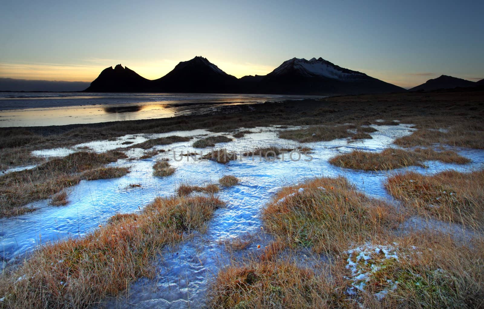 Ice shapes in the east fjords iceland at sunset in winter