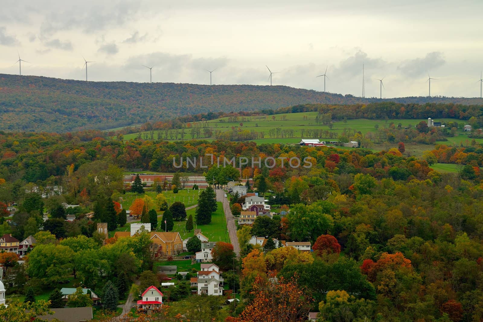 Fall color landscape in rural America with windmills