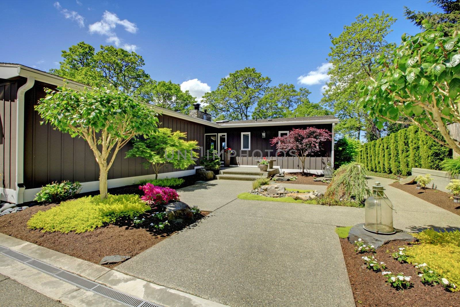 Beautiful home with garage, lake view and large front yard.