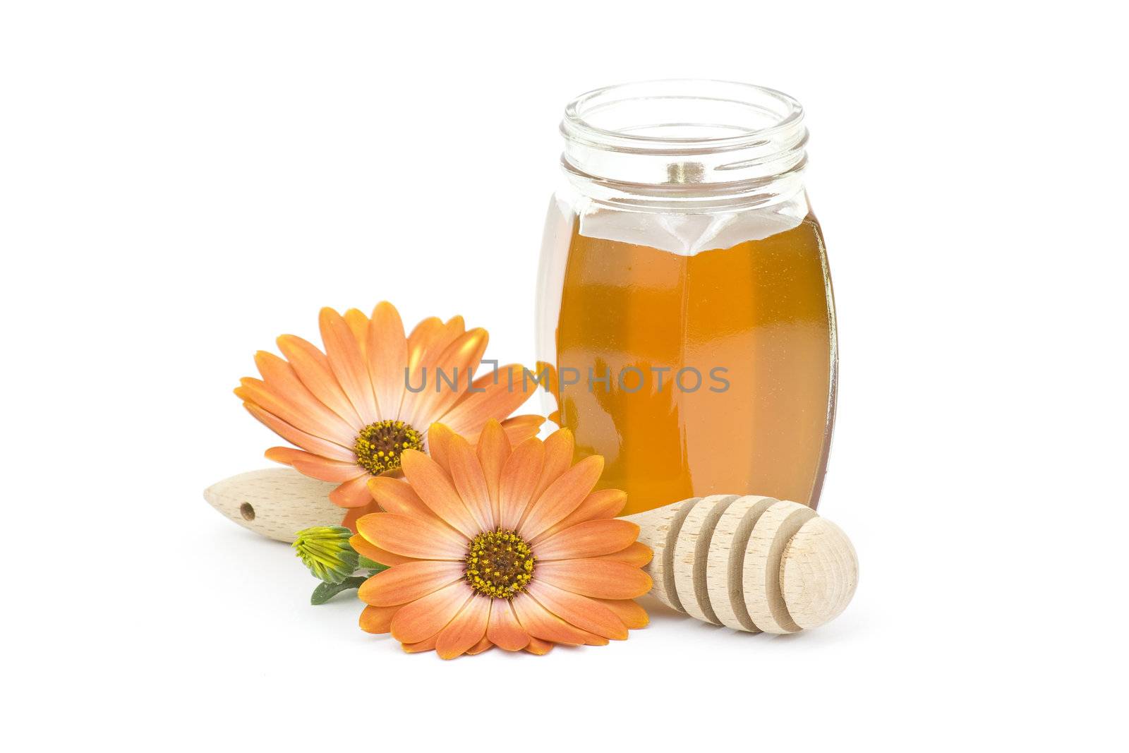 honey and flowers on white 